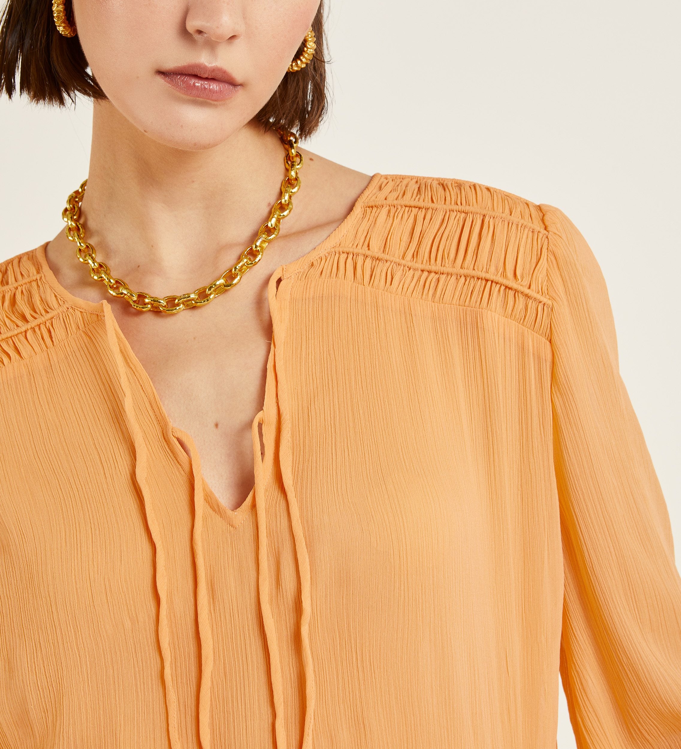 Blusa tejido efecto arrugado