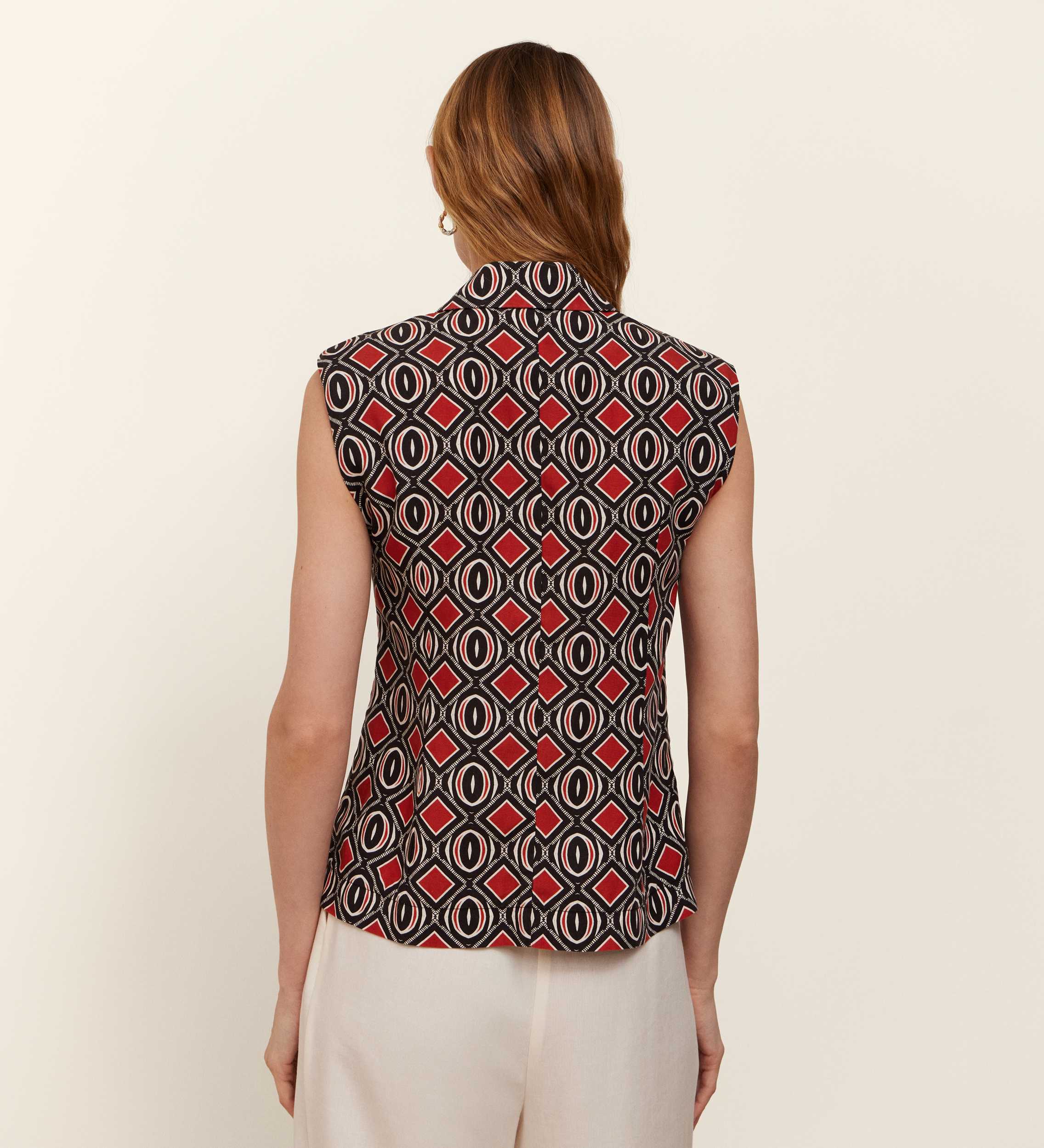 Chaleco estampado doble cruce